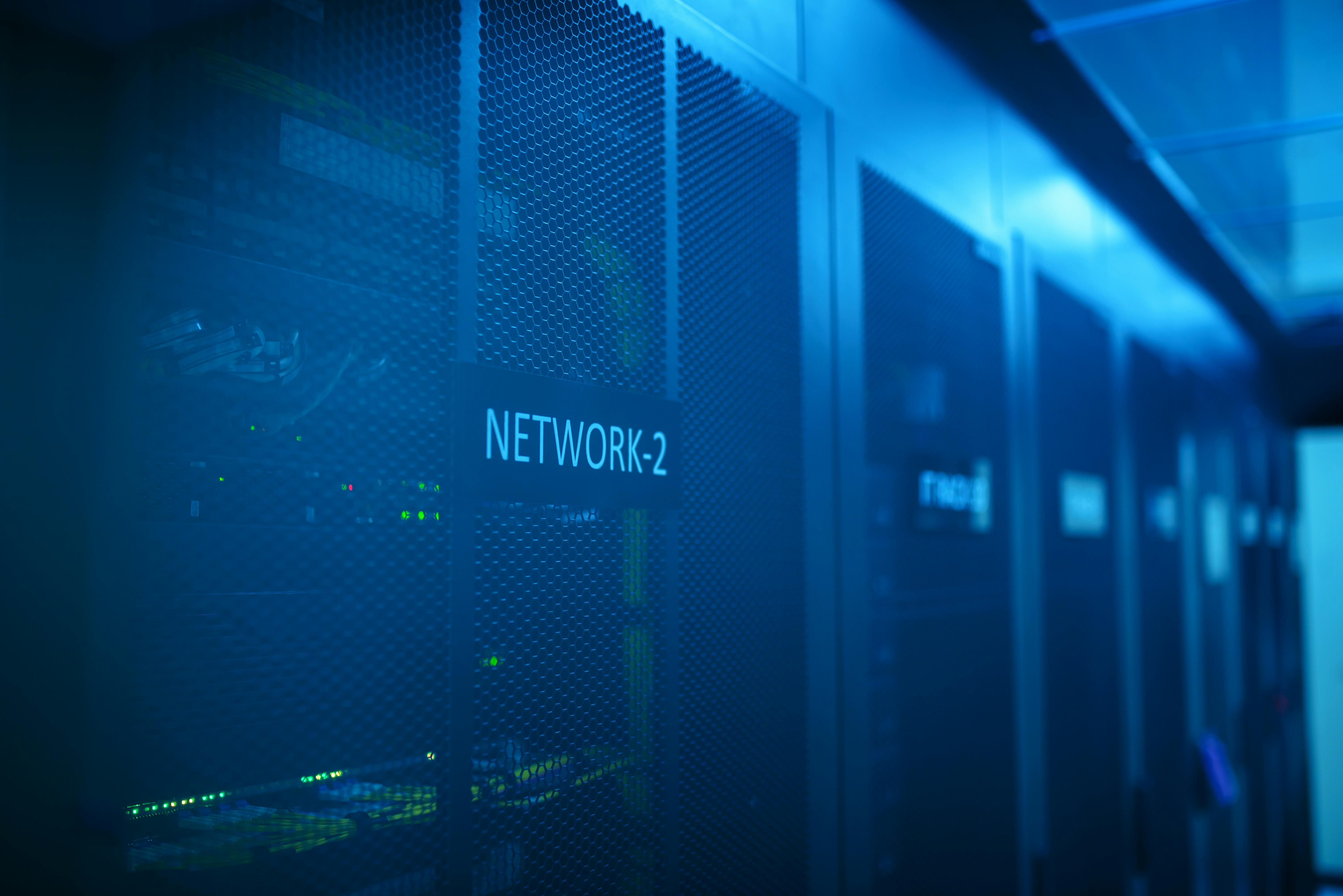 Blue-lit network rack in a server room